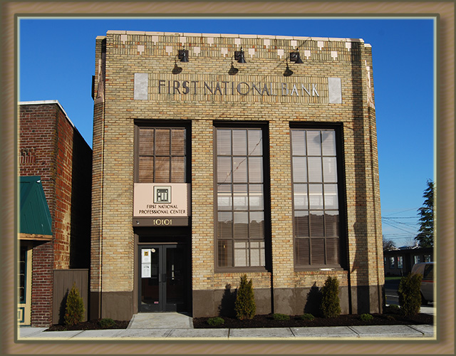 building 2-stories brick blue skies